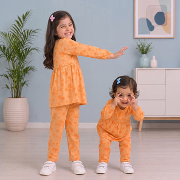 Girls Tropical Palm Tree Print Peplum Pajama Set – 2-Piece Orange Loungewear